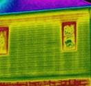Thermal picture showing heat escape through walls.
